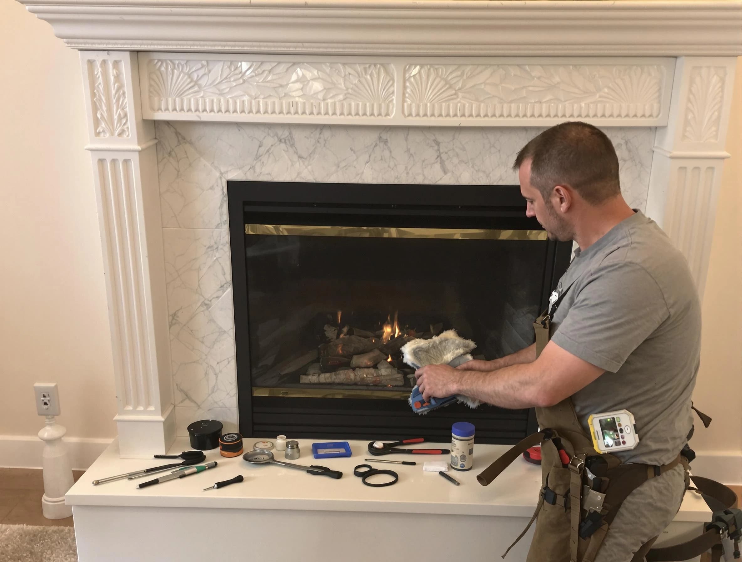 Roy Chimney Sweep performing fireplace maintenance in Roy, UT